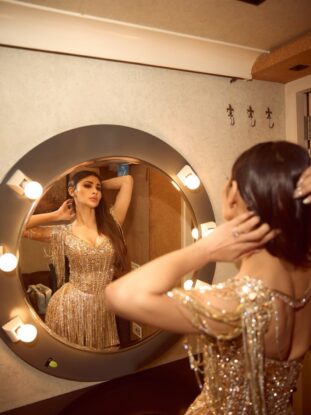 Mouni Roy Dazzles in a Traditional Lehenga at a Celebrity Wedding