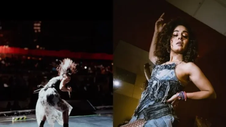 Sunidhi Chauhan performing live on stage with full energy during her concert.