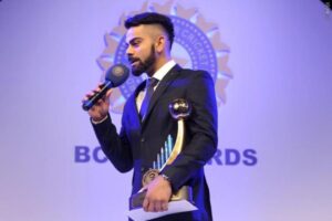 Kohli Mid-High Fade Hairstyle