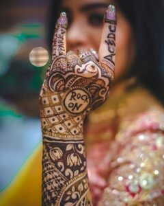 funky back hand mehndi design