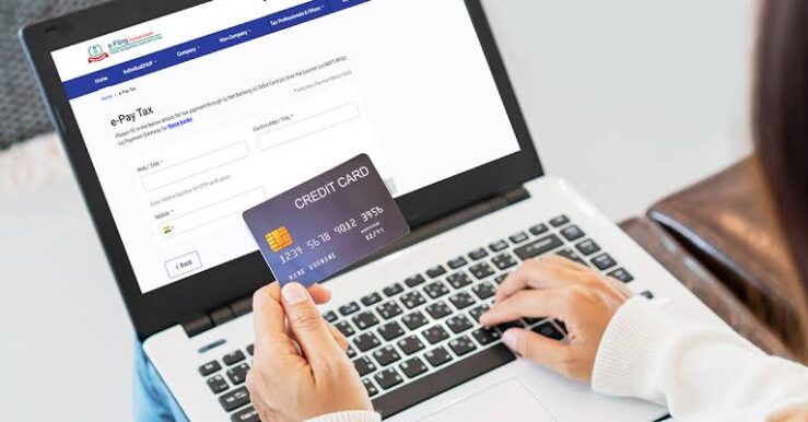 Should You Pay Income Tax With A Credit Card? Pros & Cons Evaluated