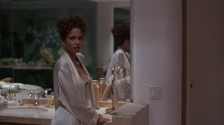 Halle Berry in The Rich Man’s Wife (1996) wearing silk robe during hot bathroom scene