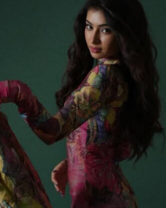 Sara Arjun posing in a patterned outfit during a studio fashion photoshoot
