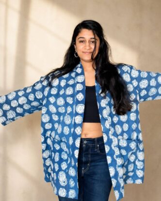 Anoushka Upadhyaya, IndiKhoj founder, wearing the brand's indigo handblock printed shrug
